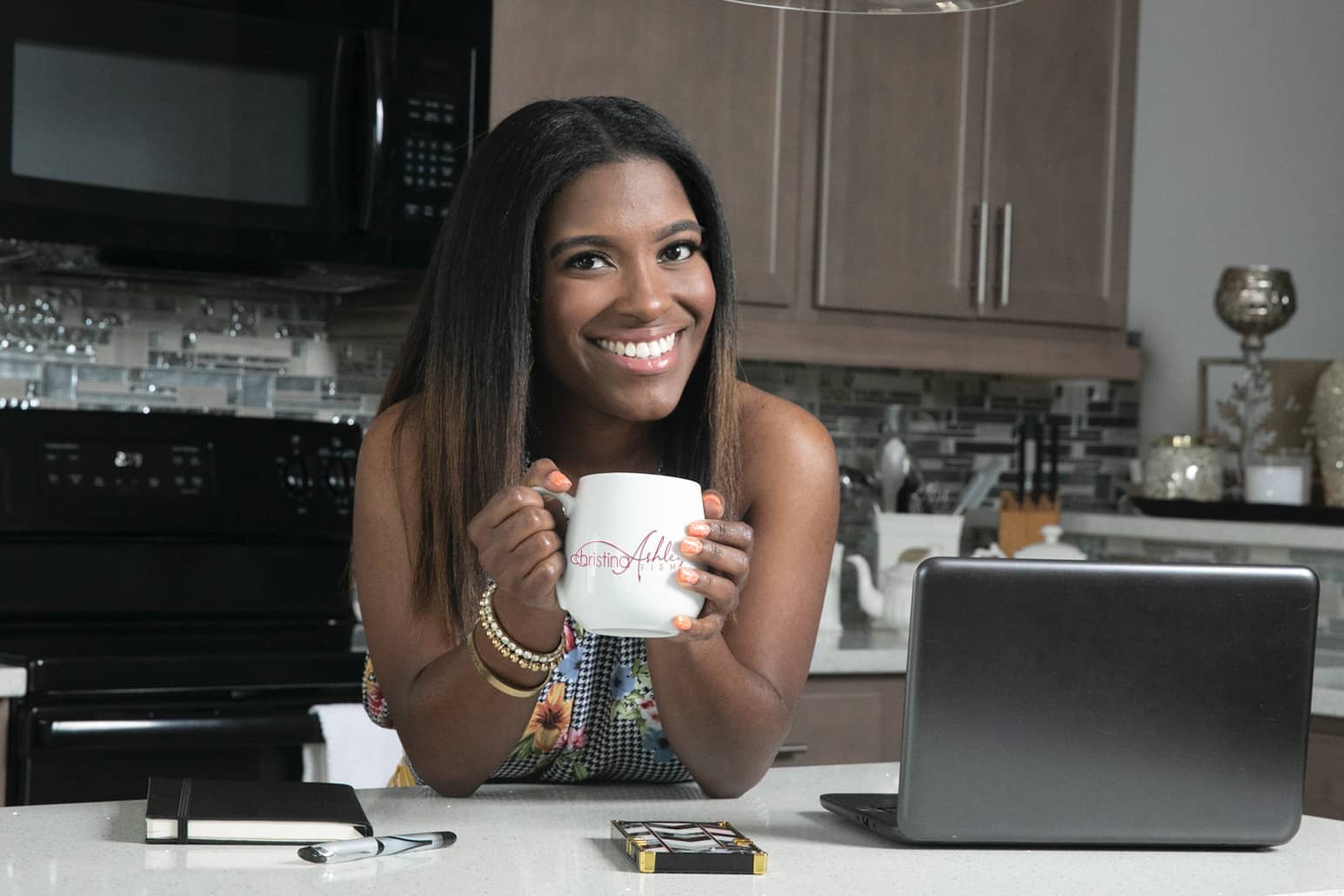 Christina Ashley in kitchen holding coffee mug