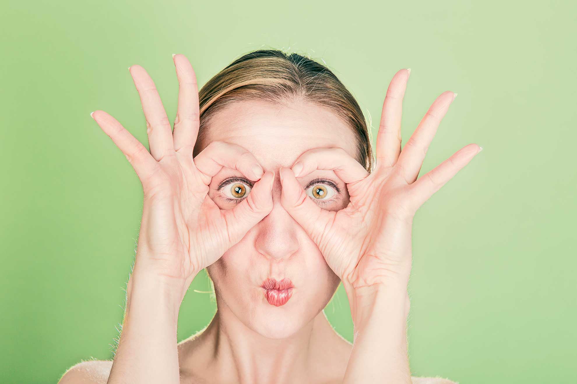 Woman on green background