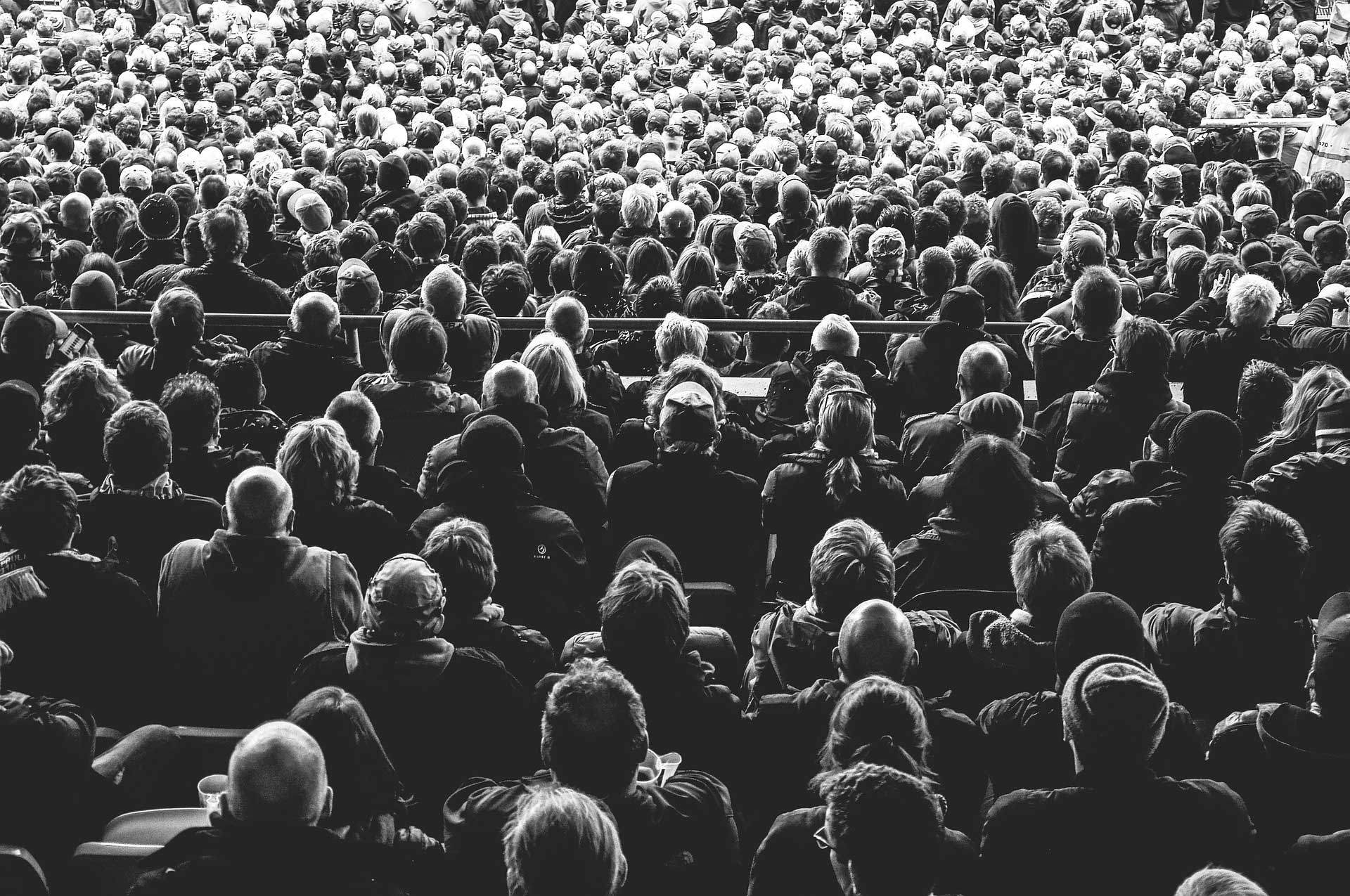 Black and white image of audience