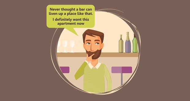 Man standing at a bar thinking to himself about how this bar livens up the place; resulting in his desire to buy the apartment within