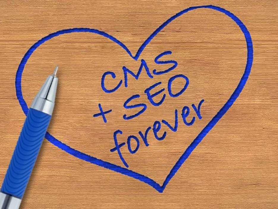 "CMS = SEO forever" Surrounded by a heart - Written in blue pen