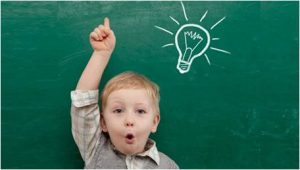 Kid with a big idea raising finger