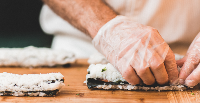 Chef making sushi.