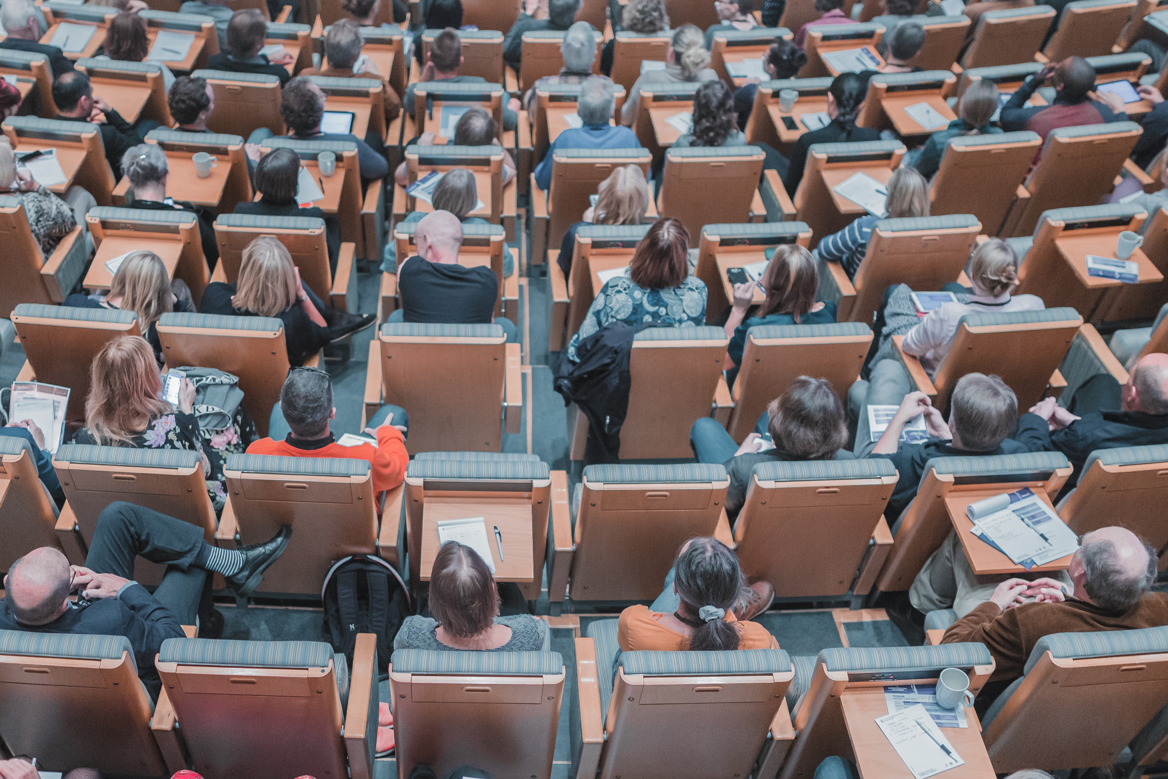 people sitting in lecture theatre