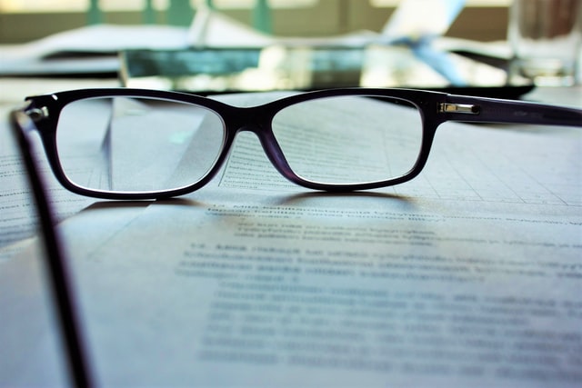 Glasses and a contract
