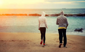 Separating couple walking on a beach