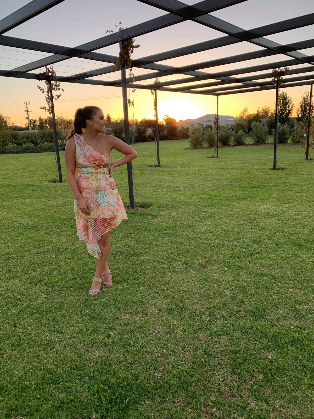 customer-wearing-talulah-floraison-midi-dress-sunset