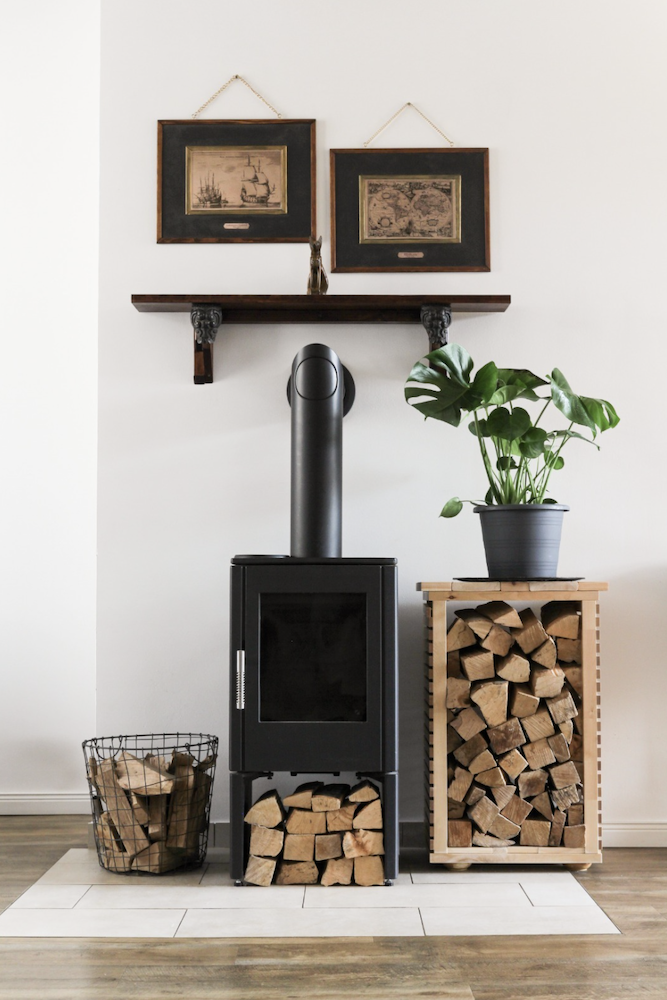 Fireplace in a scandinavian apartment available for rent for your next shooting in Berlin, Germany. Original and unique interior design and style, very bright