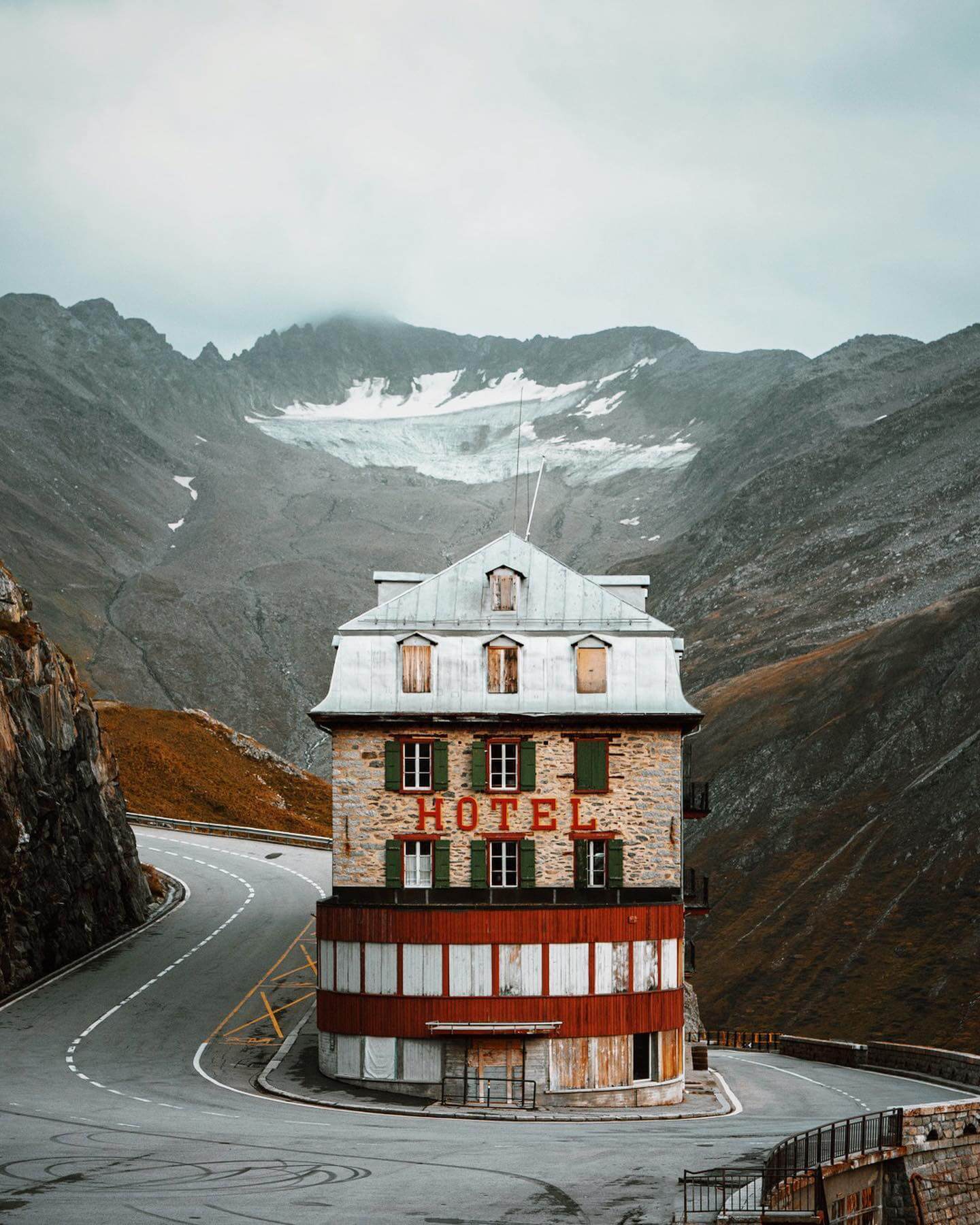 Hotel building, snow landscape, mountains