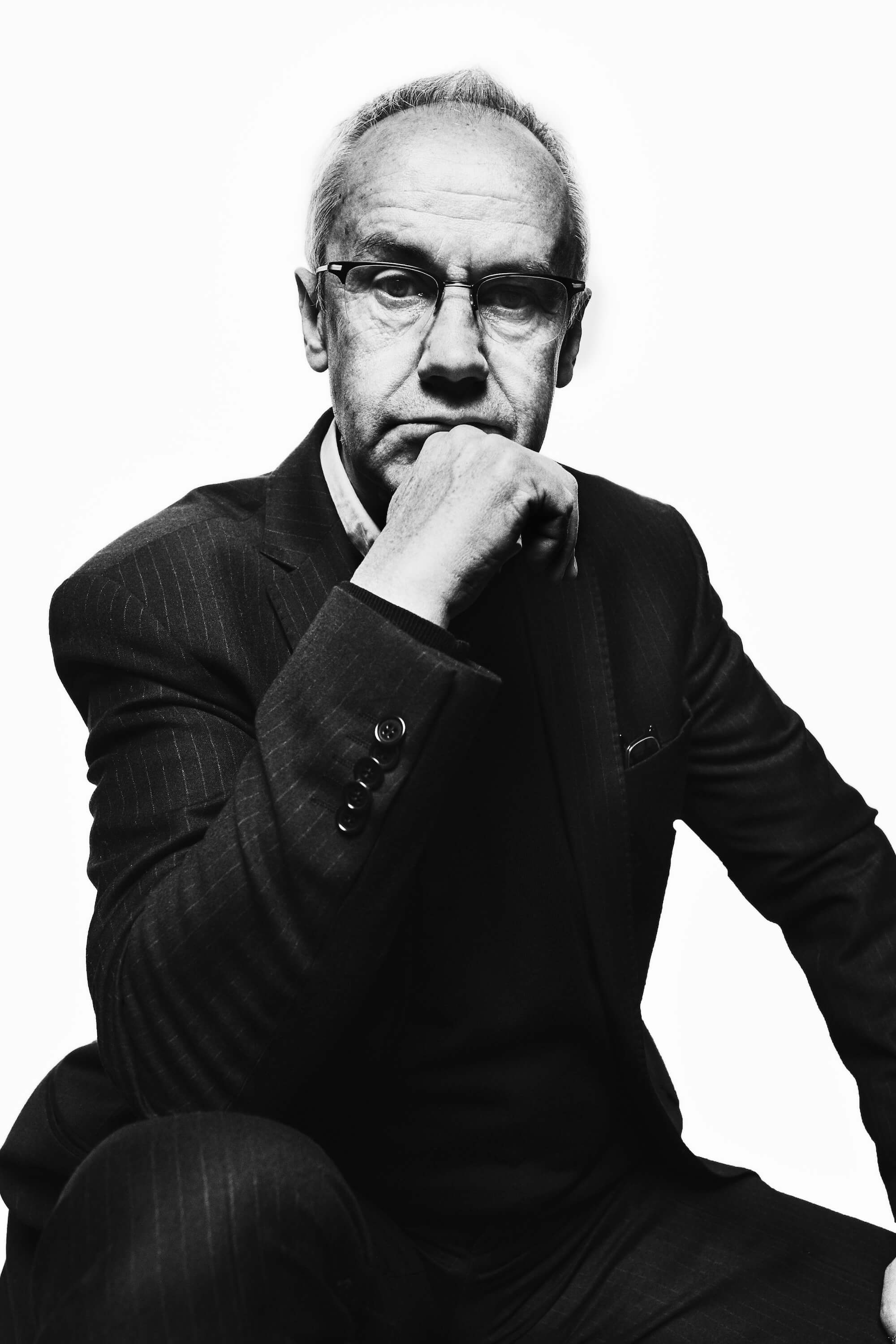 Portrait Series of Daniel Cati, black and white portrait of man with glasses