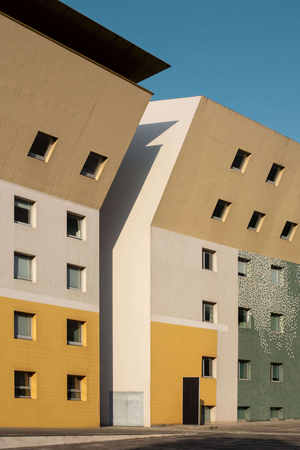 Modernist lean-to buildings.