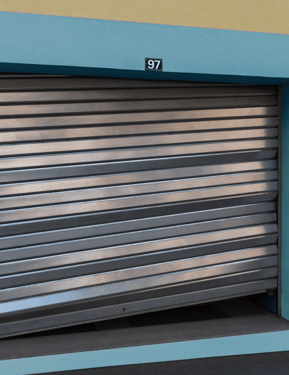 Half-open garage door.
