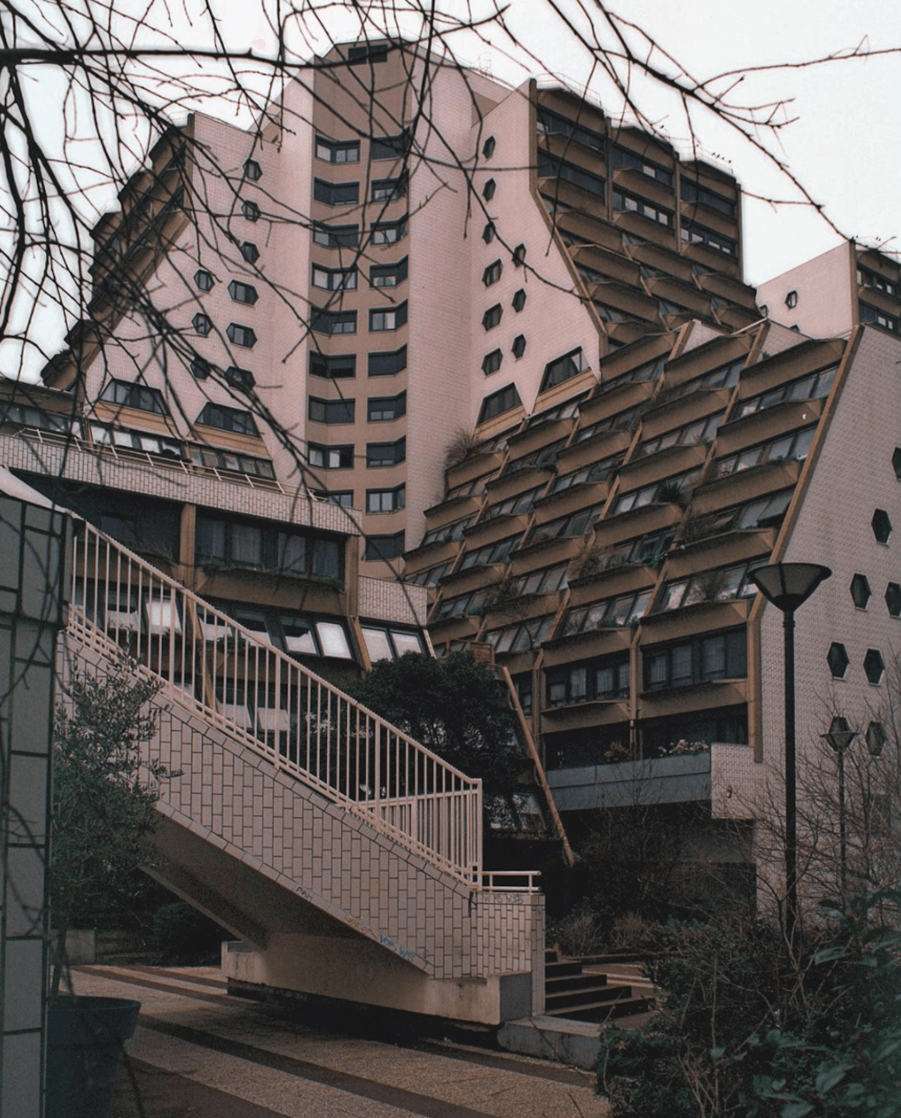 Sloped building with windows.