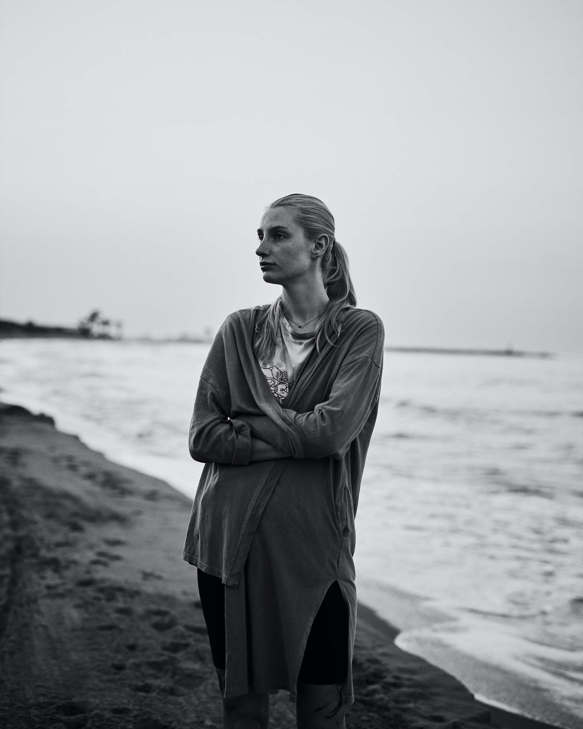 Portrait Series of Daniel Cati, black and white portrait of woman at the beach