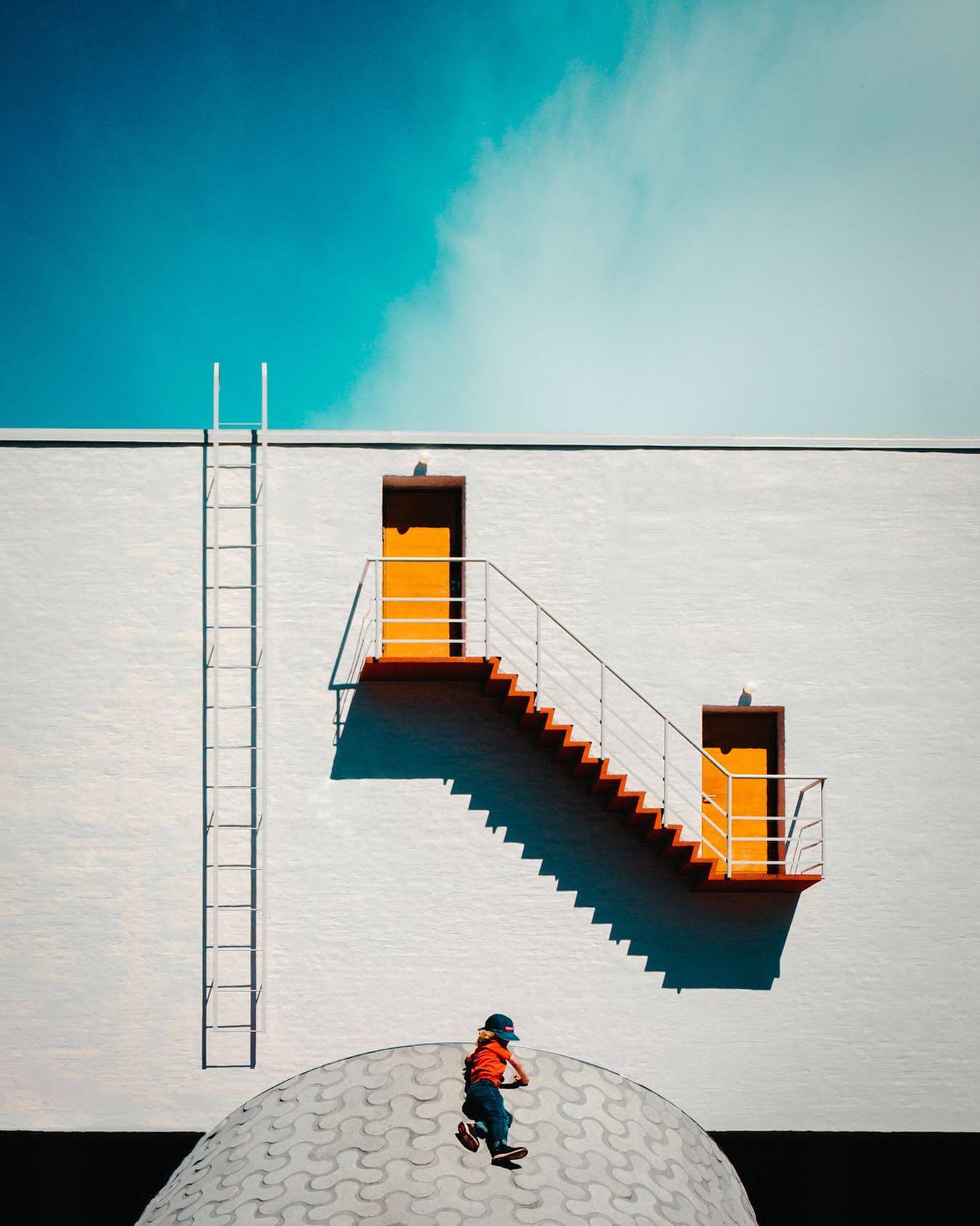 White building, orange stairs