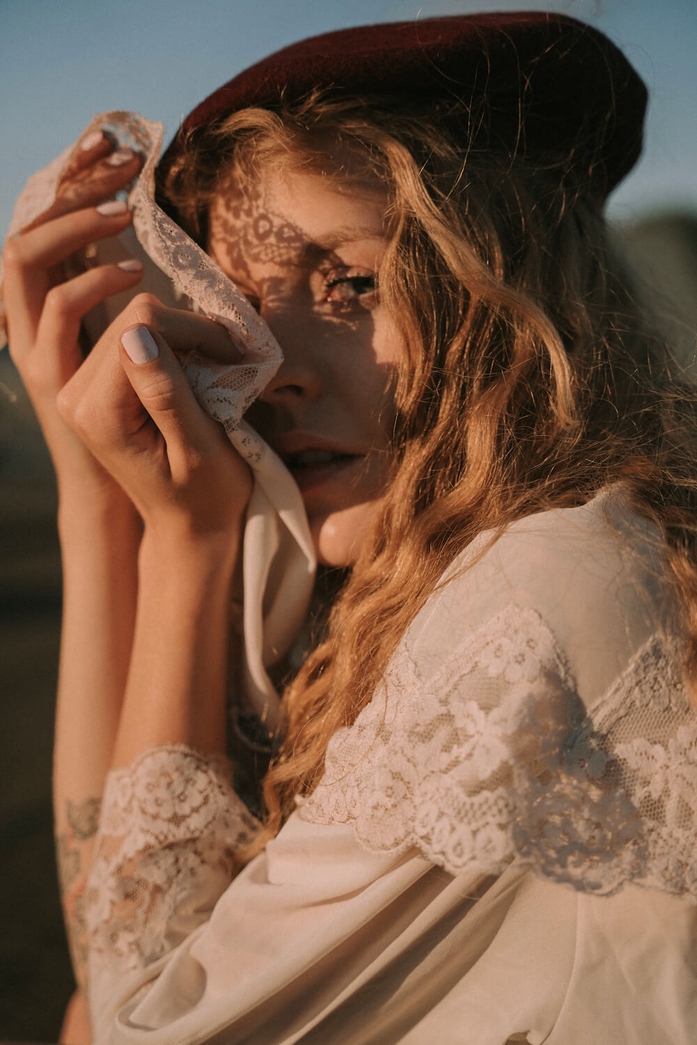 Portrait of girl with sunlight boheme style by photographer Krystsina Shyla