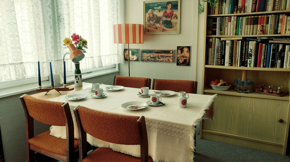 Dining room of an authentic apartment of the DDR for rent for your next shooting in Berlin, Germany. Original and unique interior design and historical style