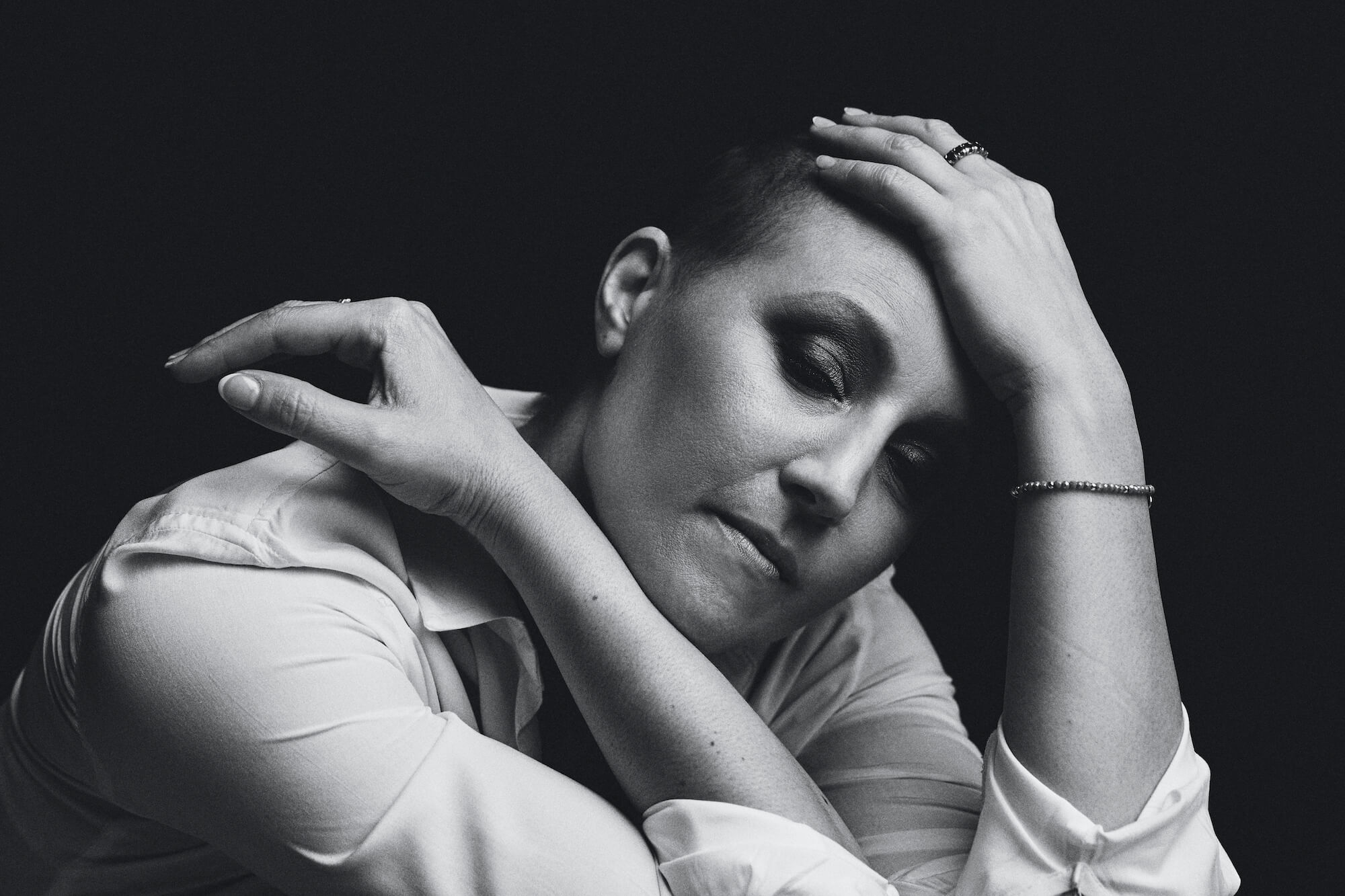 Portrait Series of Daniel Cati, black and white portrait of woman with buzz cut