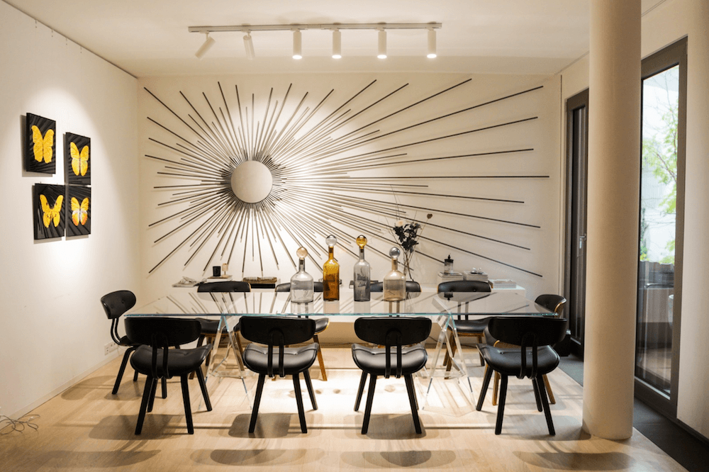 Dining room of a modern design apartment in architect building, available to rent as a film location in Berlin, Germany.