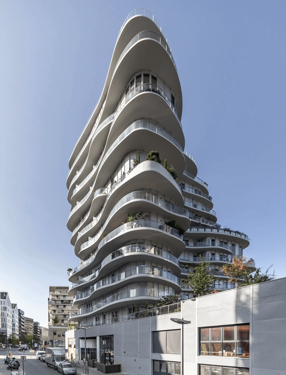 Curved and irregular modernist building.