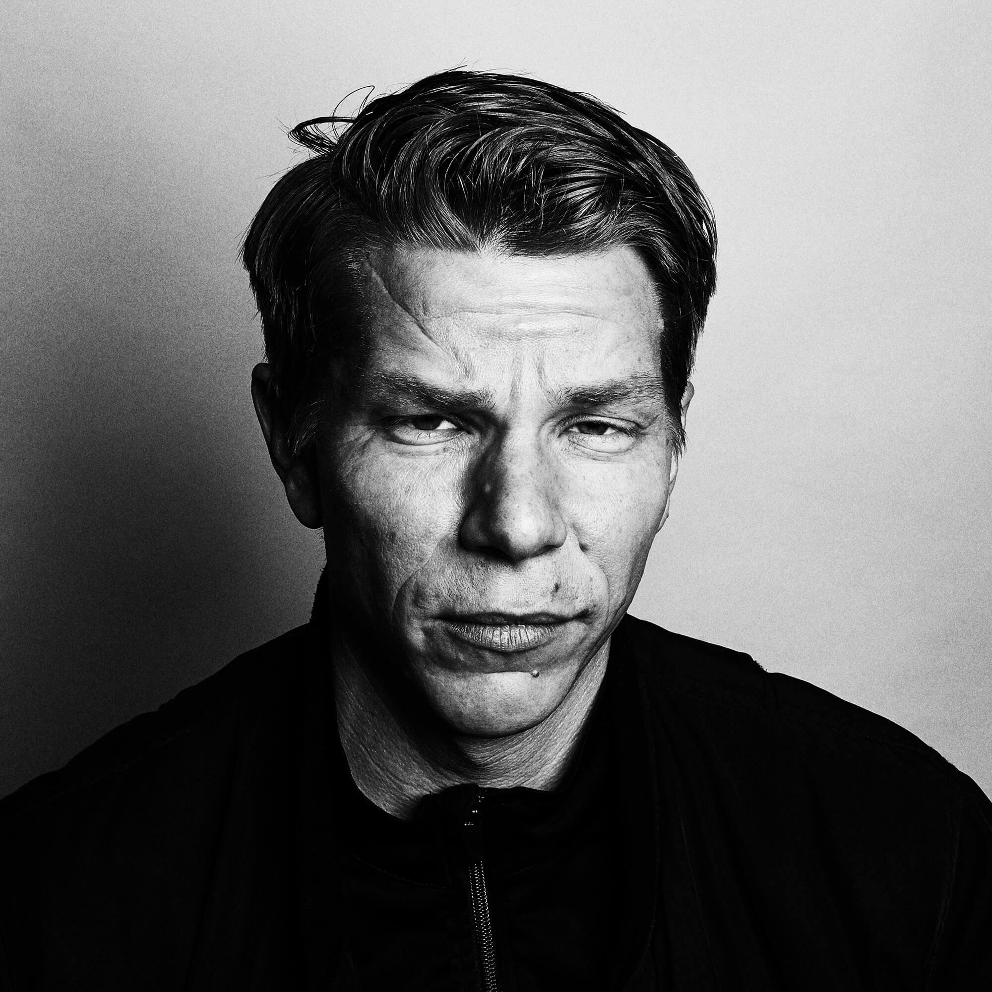 Portrait Series of Daniel Cati, black and white portrait of charismatic man