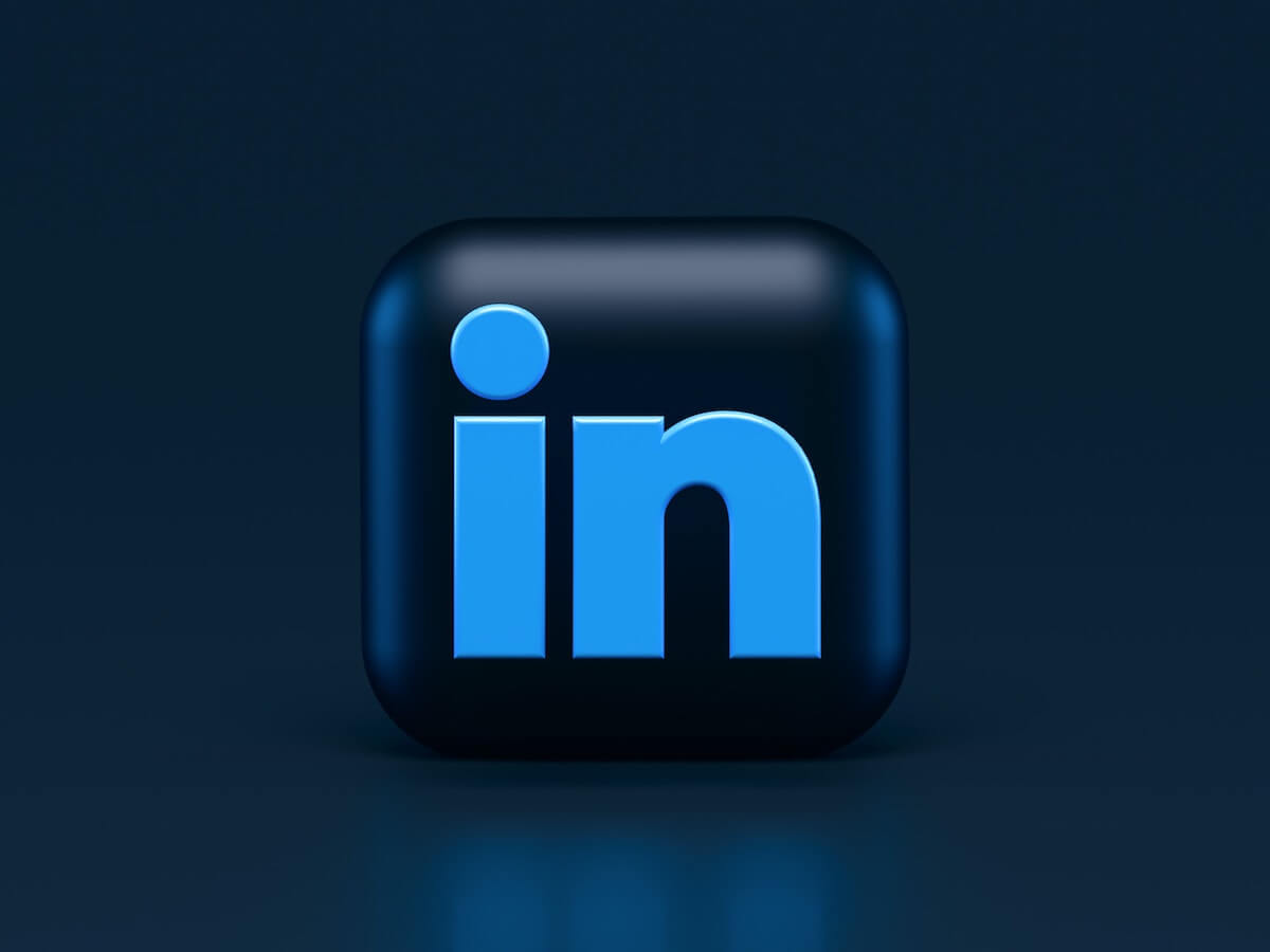 LinkedIn logo on dark background.