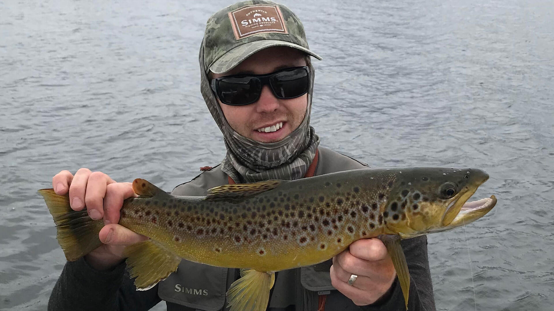 matt from trout tales holding a large tasmanian trout
