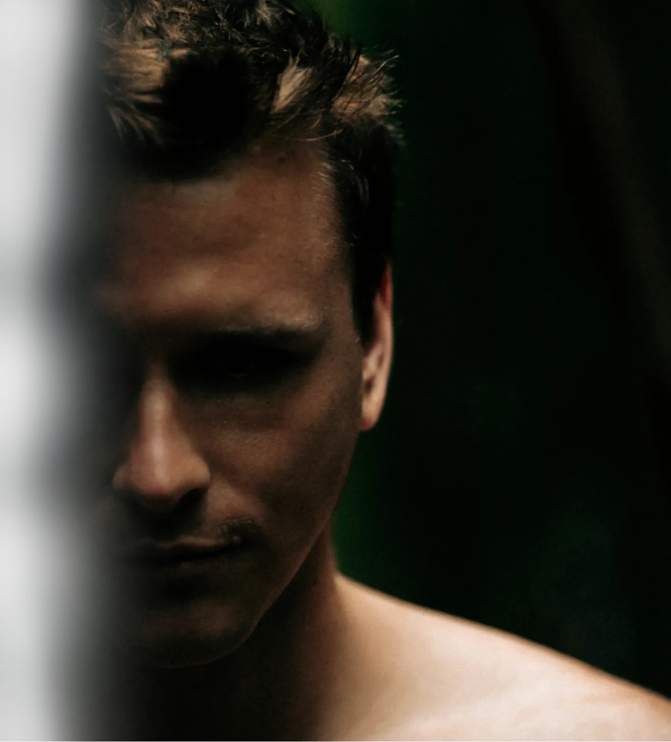 Goat athlete's face in shadow