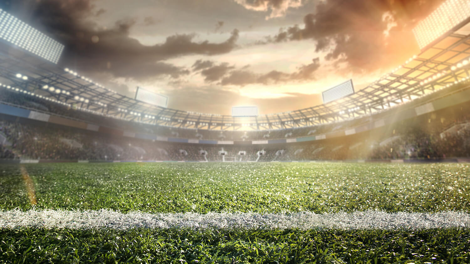 A shot of a crowd-filled stadium, looking from one end line to the other.