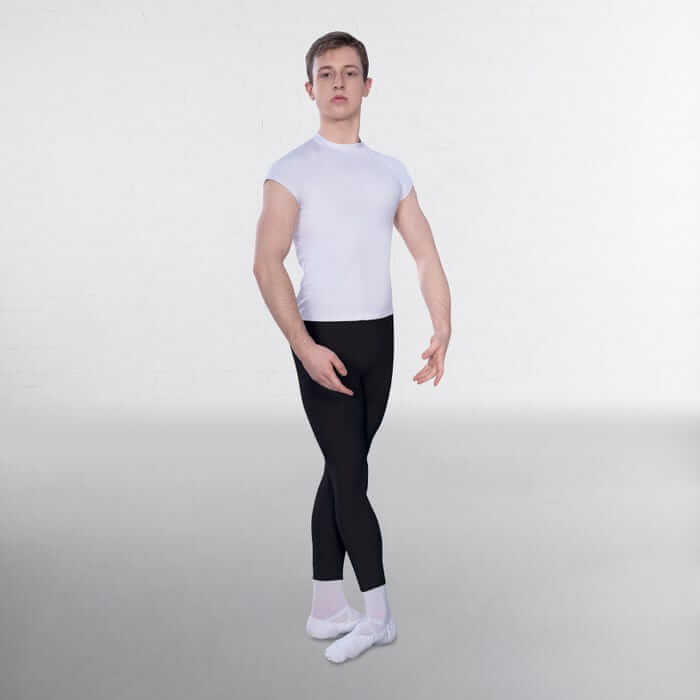 A boy demonstrating a junior, senior, and advanced boys' pair of leggings