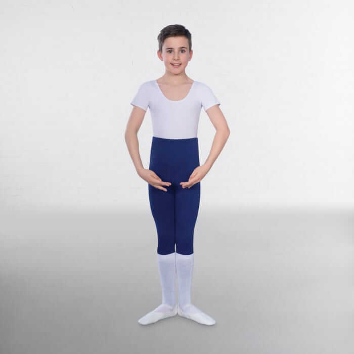 A boy demonstrating wearing tots, infant, and junior boys' leotard