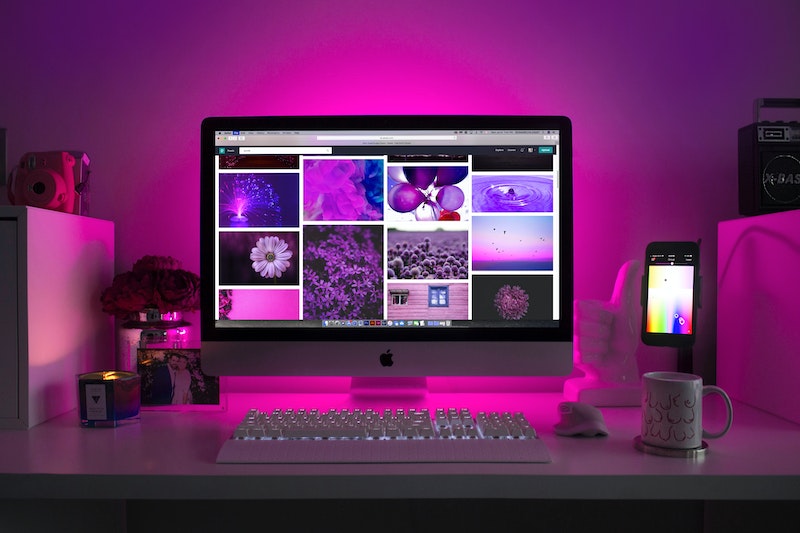 A laptop is shown in the table in which theme has shown.