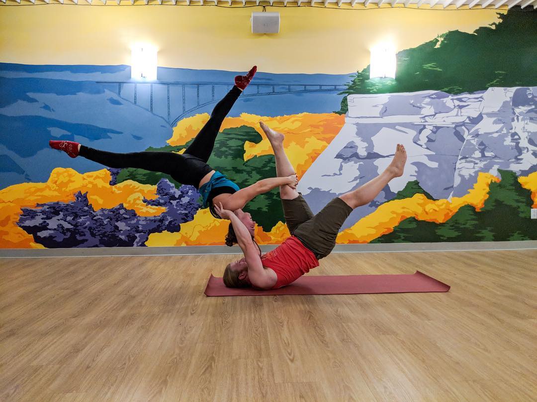 partners doing yoga in Suncrest Yoga