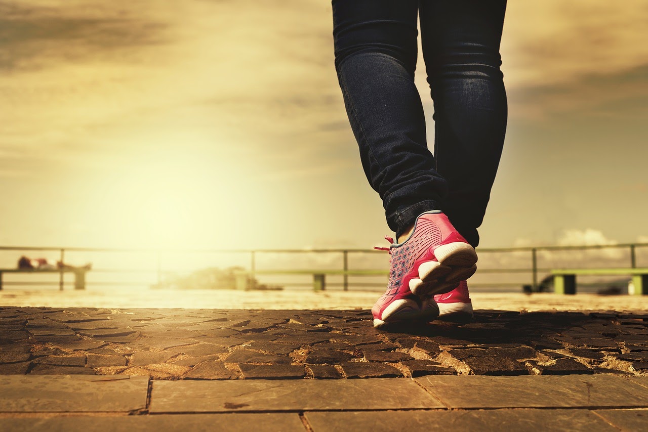 A woman is doing a walking exercise, one of the lifestyle changes a person can make to deal with depression.