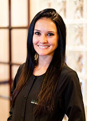 Bricey, an expanded functions dental assistant at PGA Dentistry