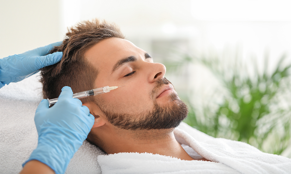 Male receiving Botox treatment