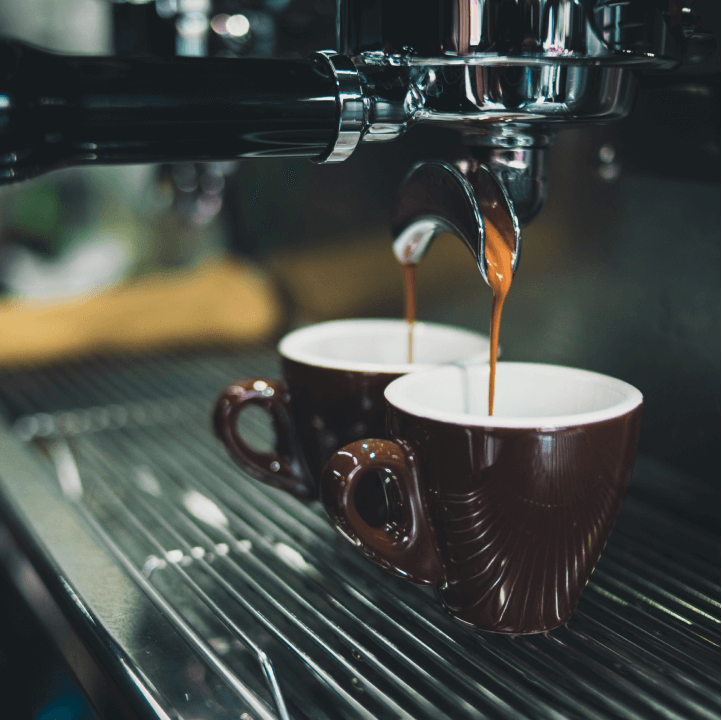 Coffee pouring into cups