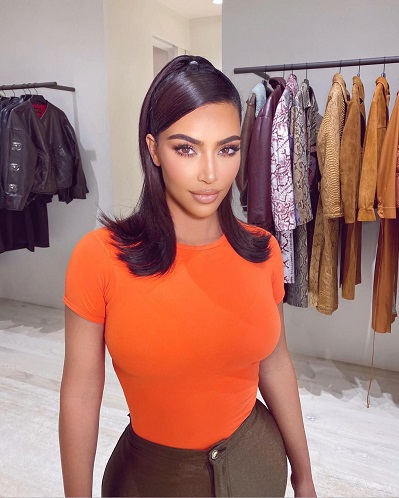 kimkardashian in orange tshirt