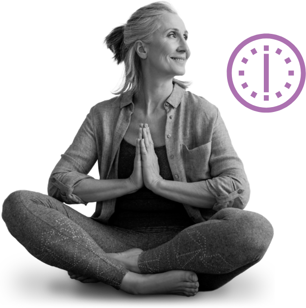 Greyscale image of serene looking older woman in a meditative posture gazing over her left shoulder.