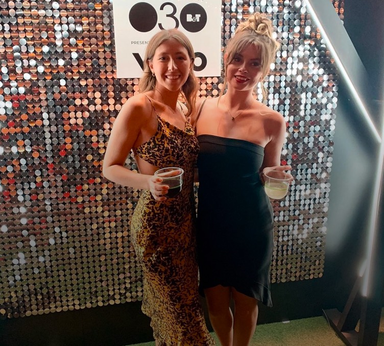 Two Works employees at an awards ceremony