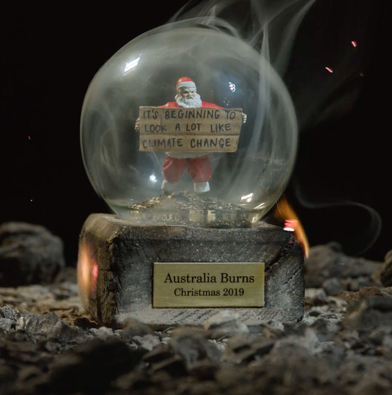 Greanpeace hero image of snow globe filled with ash