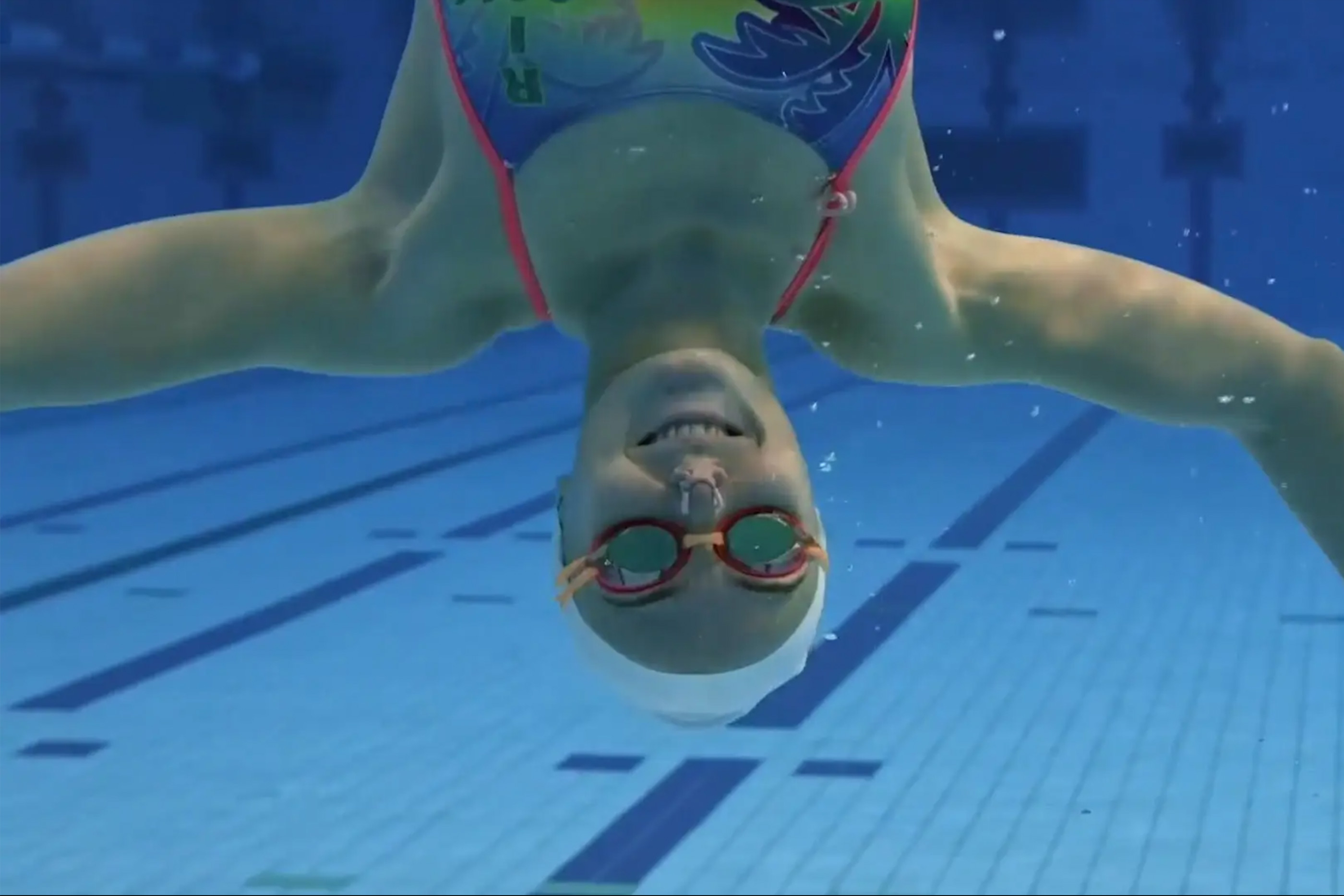 Optus support network hero of swimmer underwater