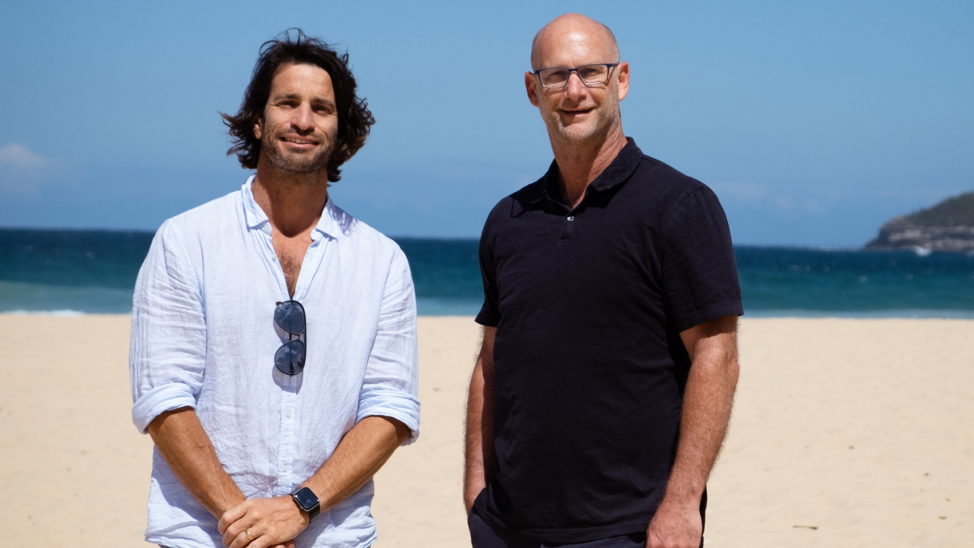 Hero image of Iggy and Damian on the beach
