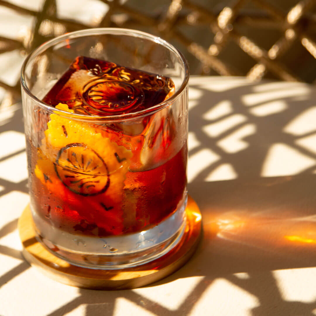 Gin, Campari e vermuthe.
