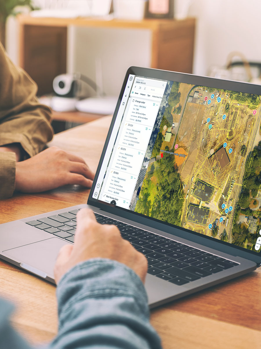 An office worker using Mobile GIS on their laptop