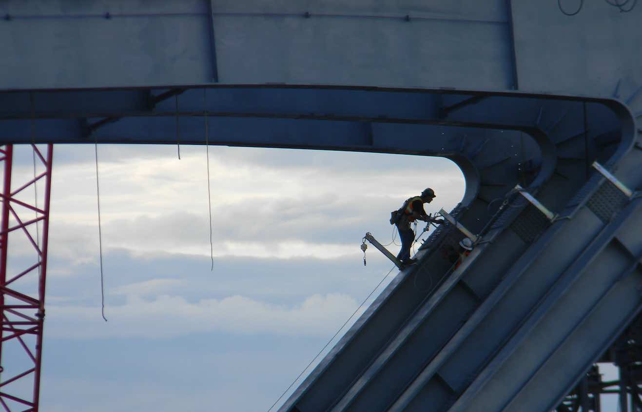 ironworker working on a bridge