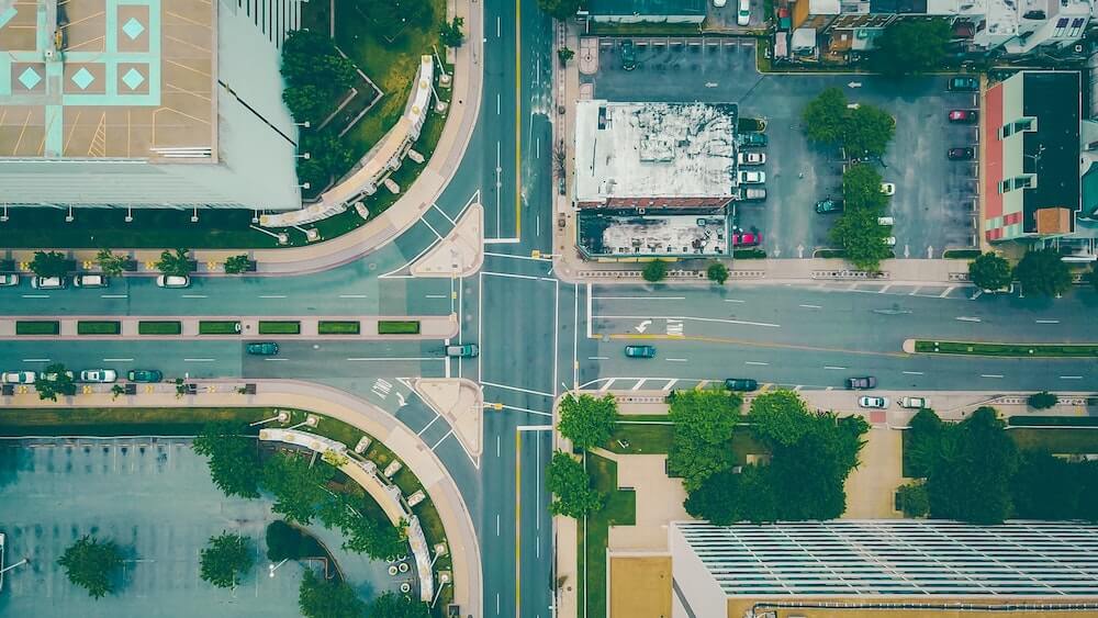 A birds-eye view of city streets and skyscrapers