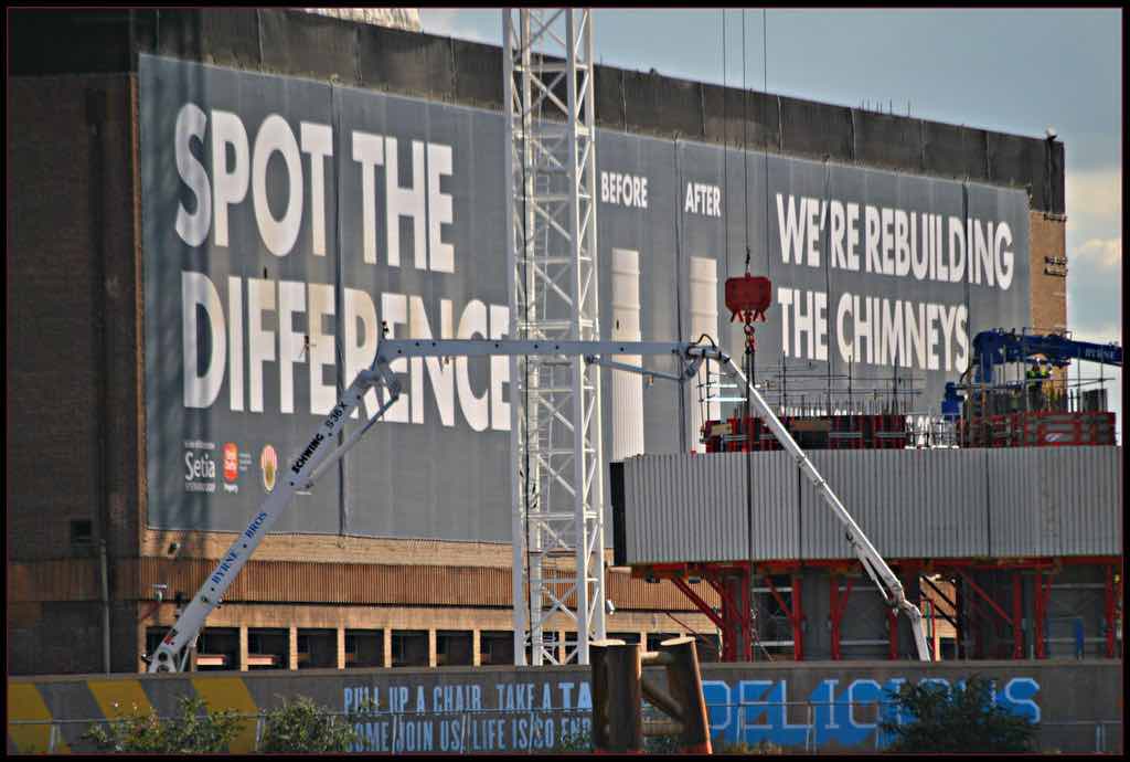 Construction company billboard ad on construction site