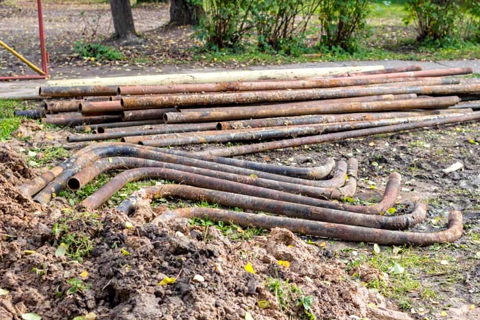 a pile of lead service lines removed through lslr