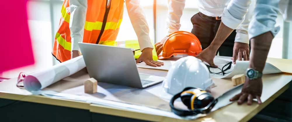 a construction team collaborating on an as-built